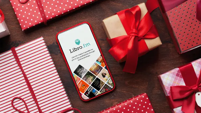 Audiobook app on photo with wrapped gifts